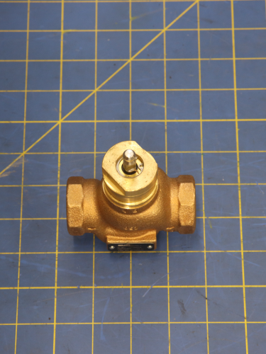 SP Belimo Valve 4.4Cv Bronze Body, SS on a blue measuring grid mat 