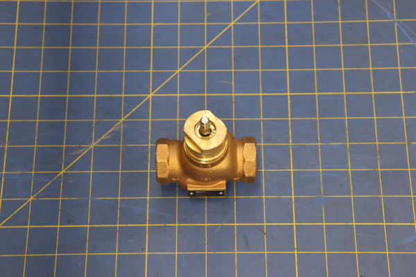 SP Belimo Valve 4.4Cv Bronze Body, SS on a blue measuring grid mat 