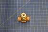 SP Belimo Valve 4.4Cv Bronze Body, SS on a blue measuring grid mat 